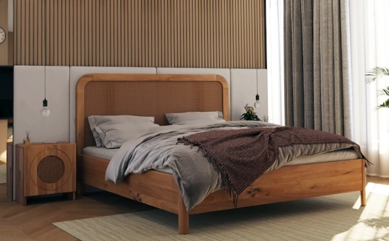 Drewniane łóżko do sypialni z rattanowym zagłówkiem