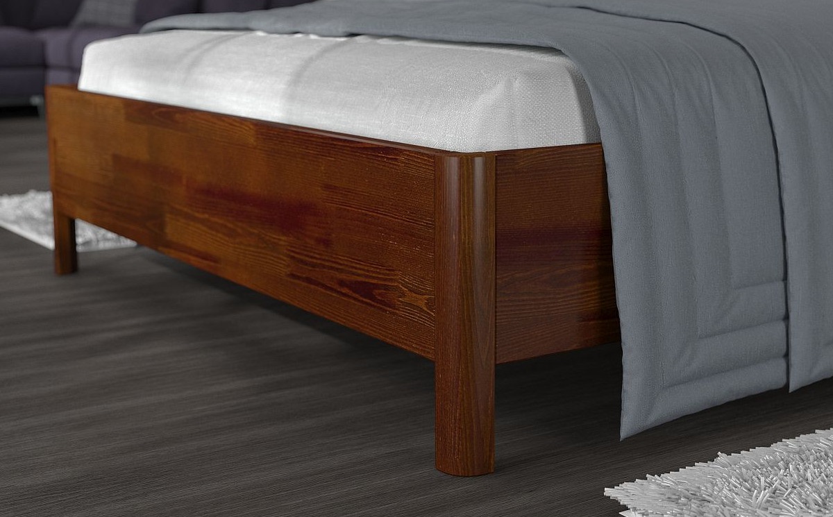 Drewniane łóżko o zaokrąglonych krawędziach
