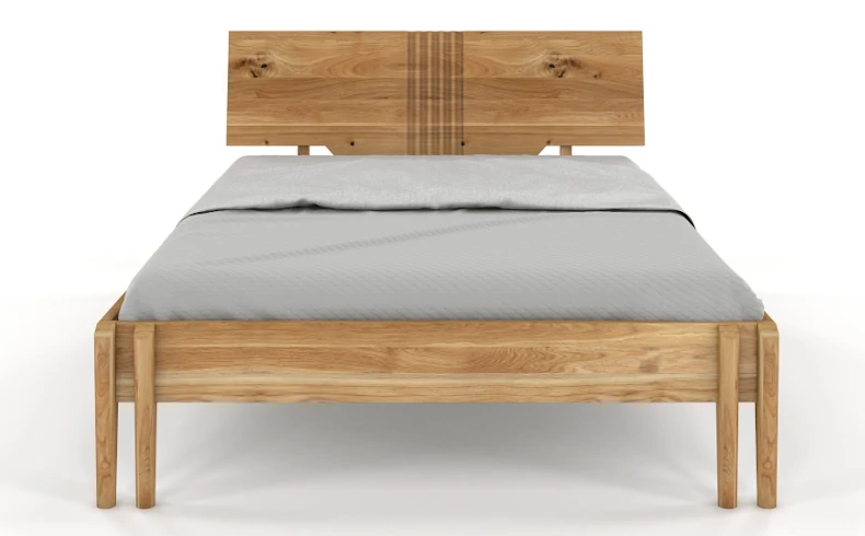 Wysokie łóżko z drewnianym zagłówkiem
