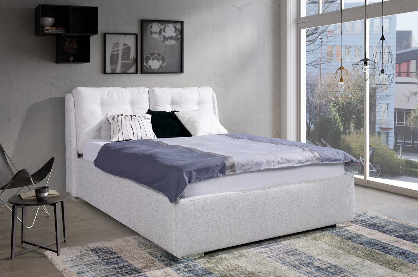 Eleganckie łóżko tapicerowane do sypialni ADRANO z poduszkami na zagłówku