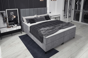 Tapicerowane łóżko kontynentalne ROMA z zagłówkiem z pionowymi przeszyciami