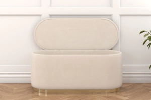 Beżowy owalny puf ze schowkiem Dancan SCARLETT na złotej podstawie