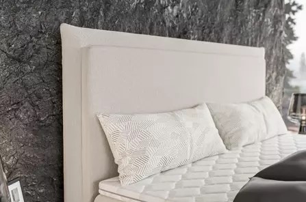 Eleganckie tapicerowane łóżko kontynentalne do sypialni CAMEL z pojemnikiem na pościel